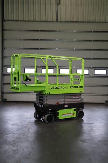 Green Zoomlion aerial lift in the hall.