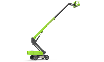 Green scissor lift on four wheels