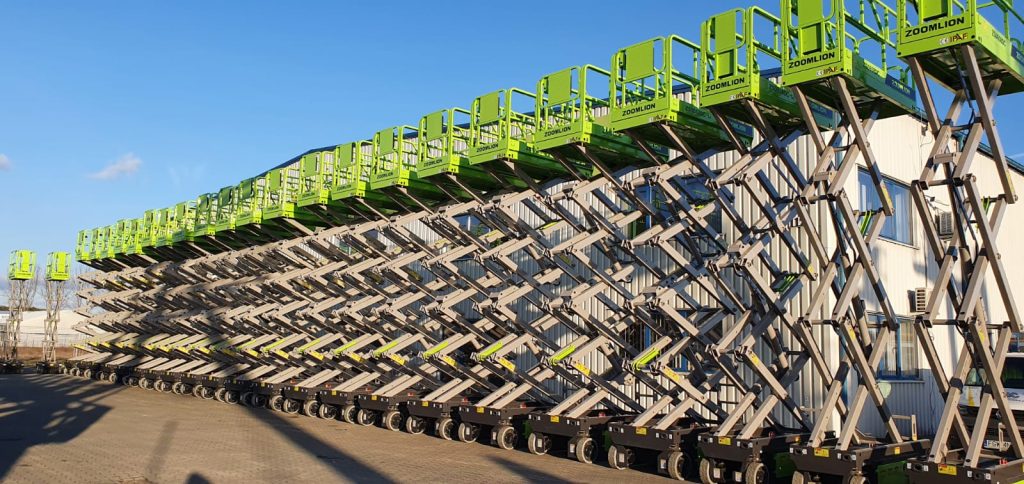 Zoomlion scissor lifts parked in a row.