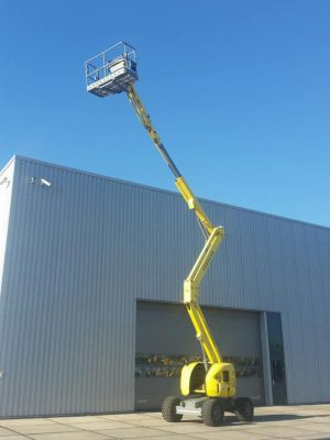 An aerial lift at an industrial building.