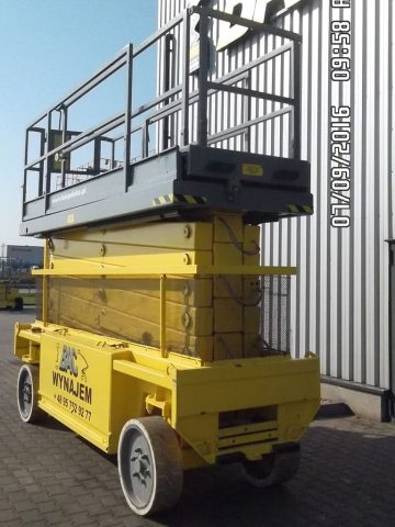 Yellow scissor lift for rent.