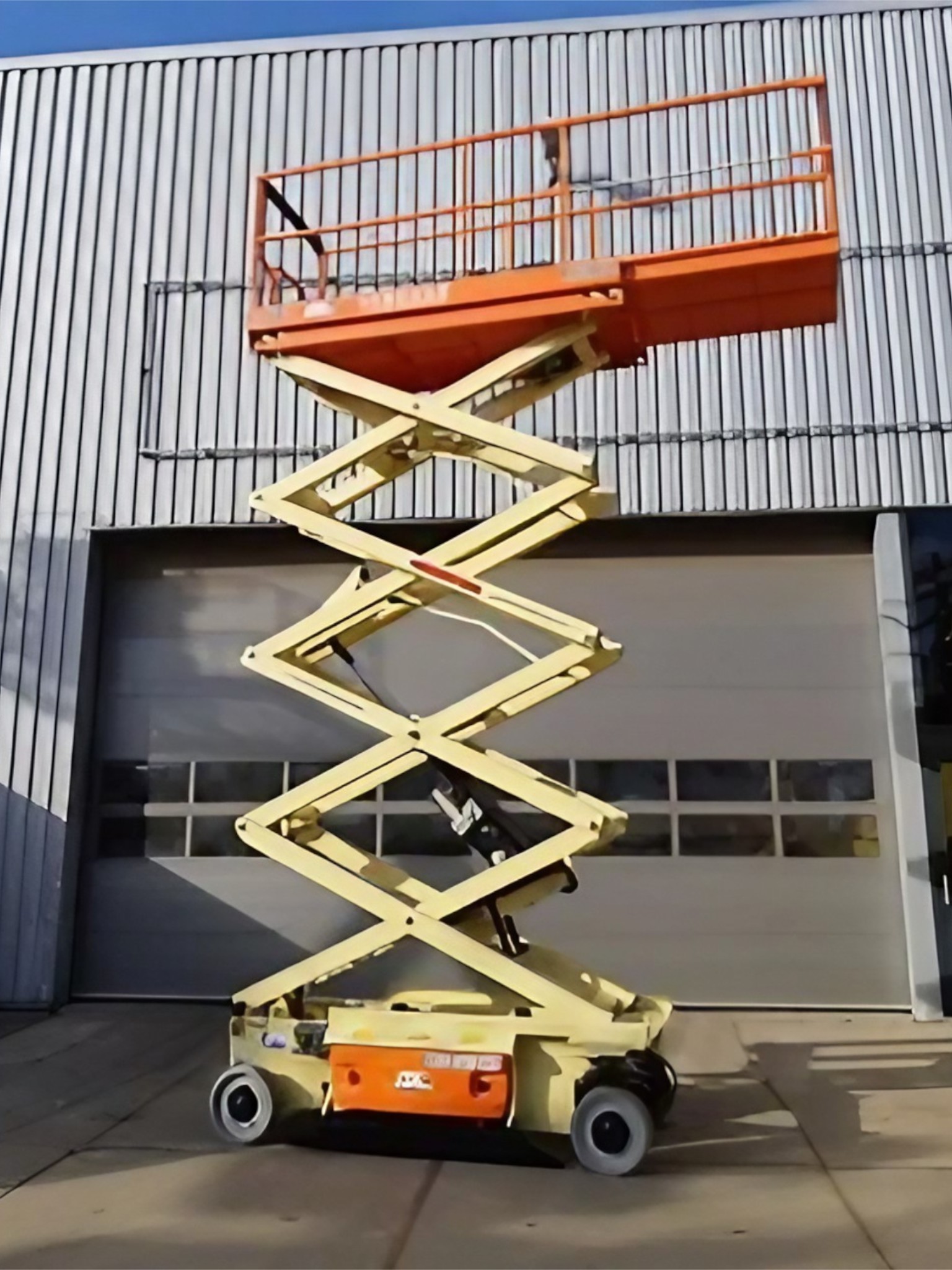 Scissor lift on construction site.