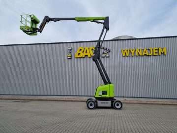 Zoomlion aerial lift in front of the "BAS RENTAL" building.