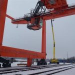 A harbor crane against a winter sky.