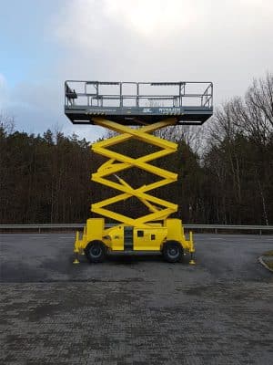 Yellow outdoor scissor lift.