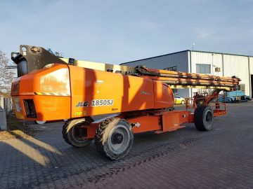 JLG 1850SJ aerial work platform on a construction site.