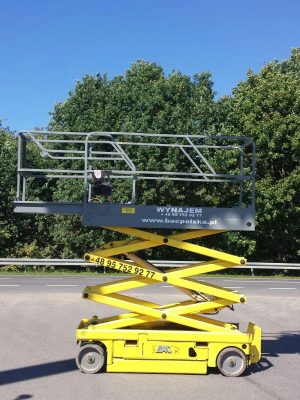 Yellow outdoor scissor lift.