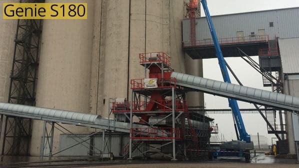Genie S180 elevator at industrial silos.