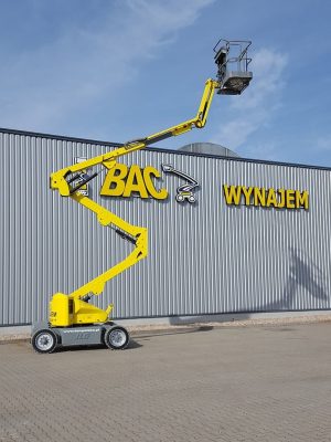 A basket lift in front of the hall with the sign "BAC Rental".