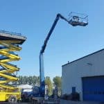 Scissor and basket lifts next to the hall.