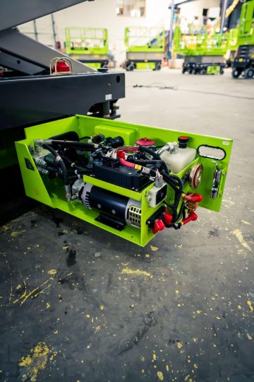 The hydraulic motor of the elevator on the industrial floor.