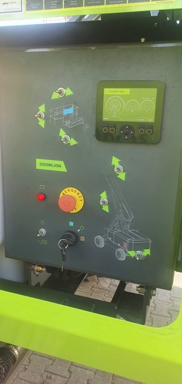 Zoomlion crane control panel with buttons and display.