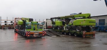 A lift on a transport trailer, a rainy day.