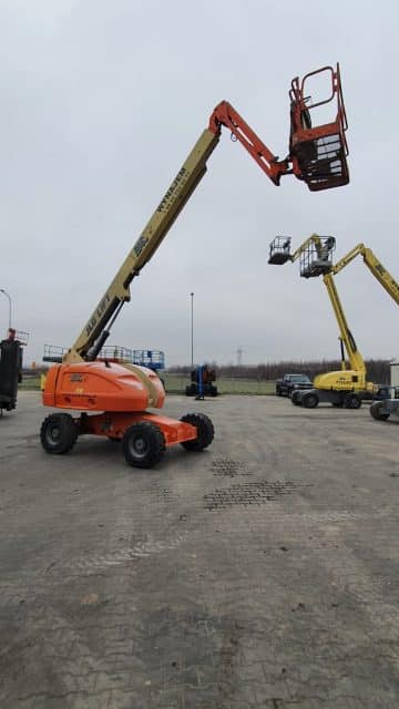 Scissor lifts on the construction site.