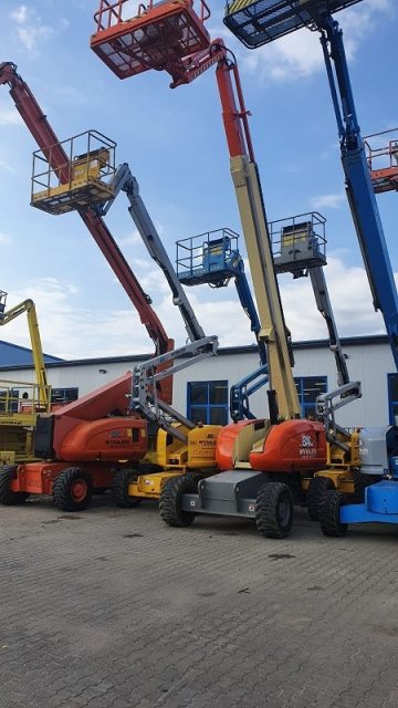 Aerial work platforms in the construction machinery yard.