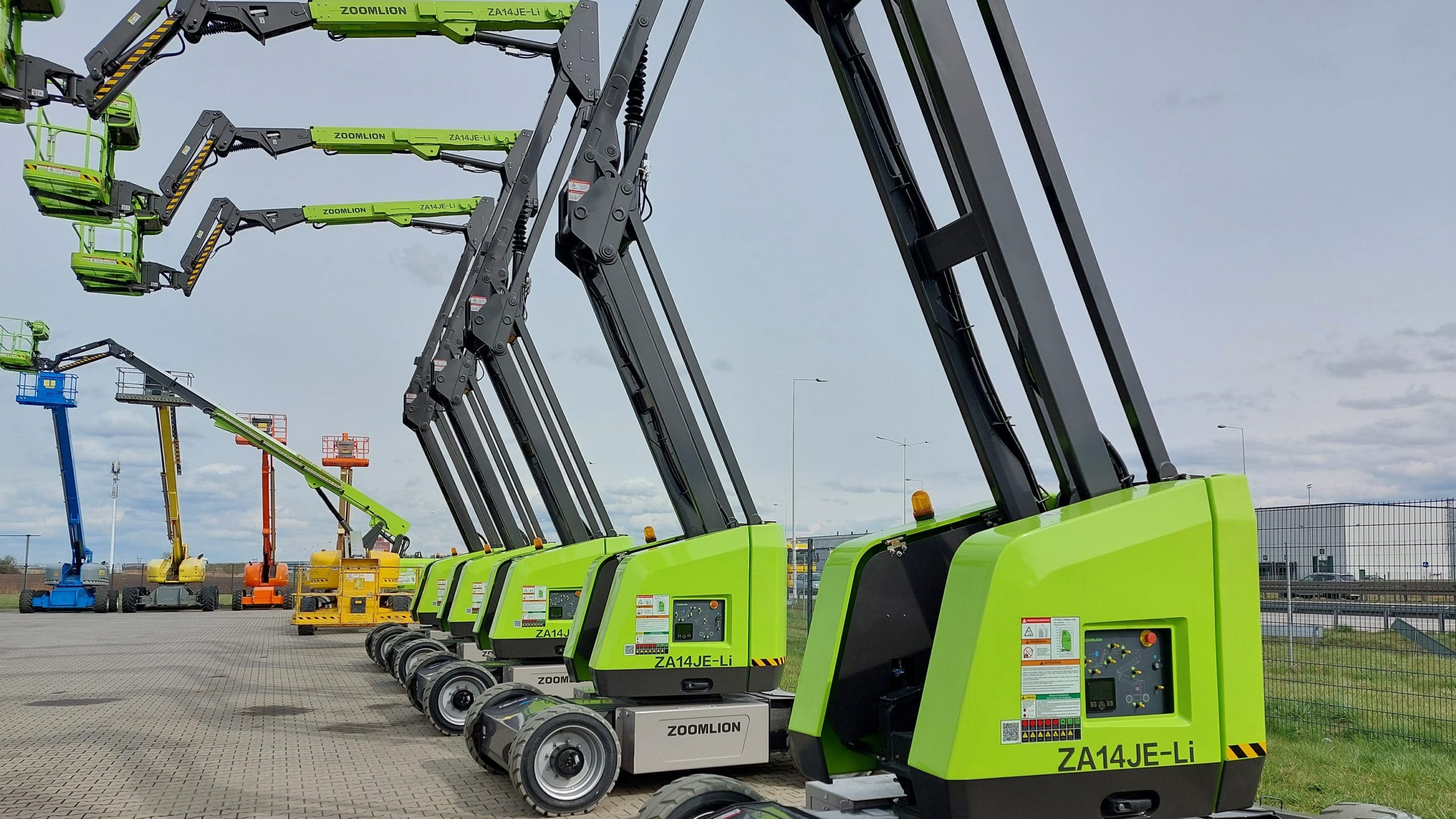 Zoomlion brand aerial lifts in a row.