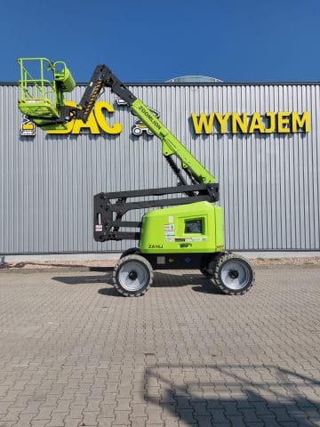 A green lift platform in front of the "Rental" sign.