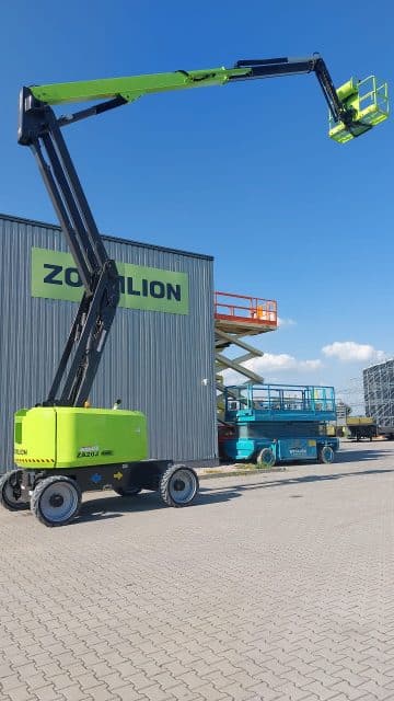 Scissor and boom lifts on the construction site.