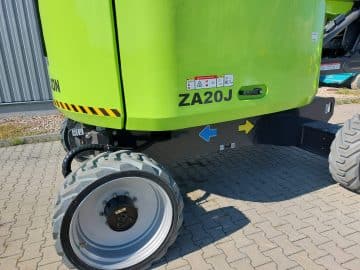 A green construction machine with the ZA20J designation.