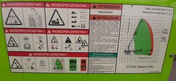 Tablica ostrzegawcza bezpieczeństwa przy obsłudze maszyn.