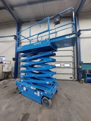 Haulotte scissor lift on the industrial floor.