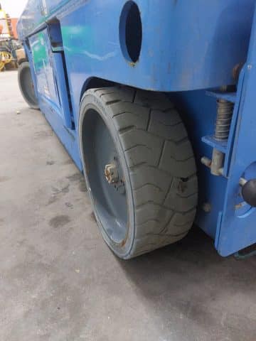 Large industrial forklift, close-up of the wheel.