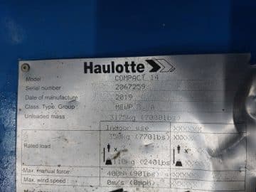Паспортна табличка підйомника Haulotte Compact 14.