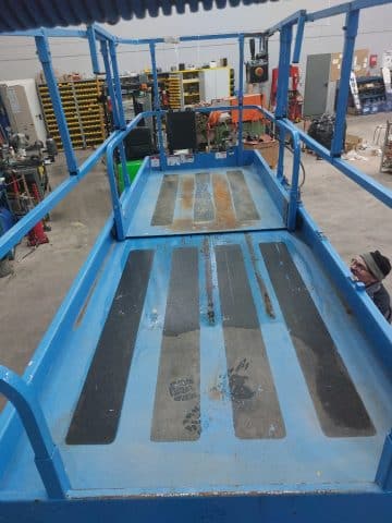 Belt conveyor in an industrial workshop.