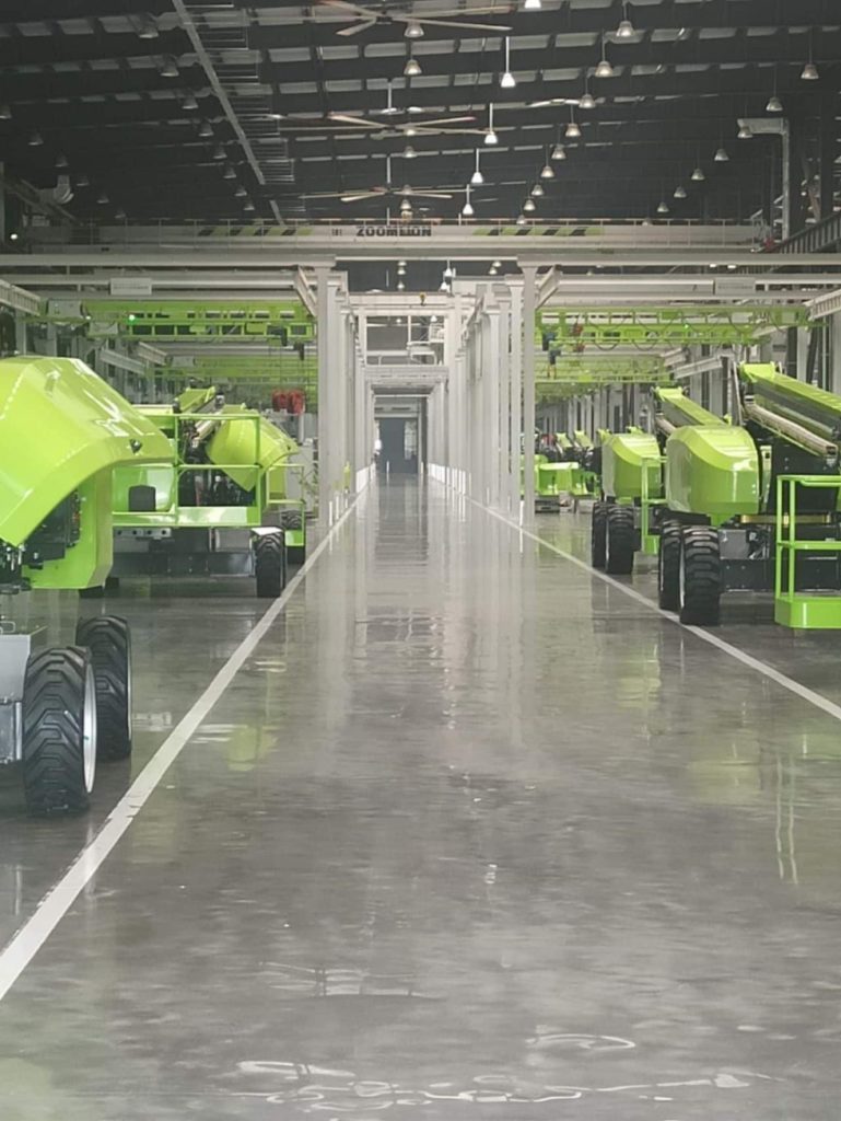 Production hall with agricultural machinery.