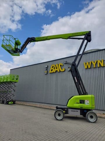Zoomlion aerial lift in front of the warehouse.