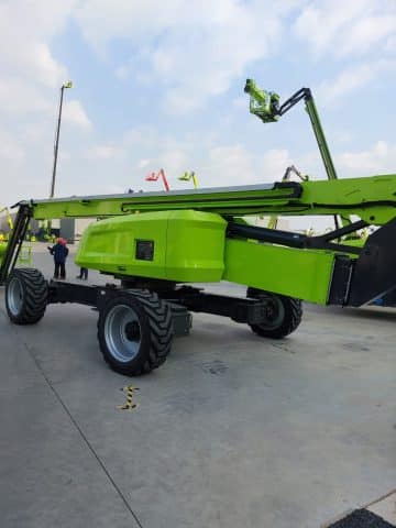 Green outdoor aerial lift.